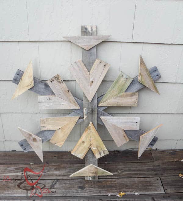 DIY wooden Christmas snowflake on porch