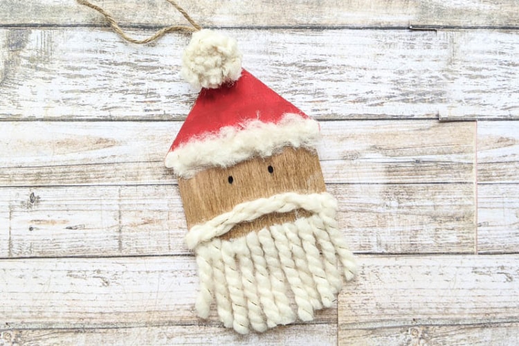 Woods Santa ornament with yarn beard