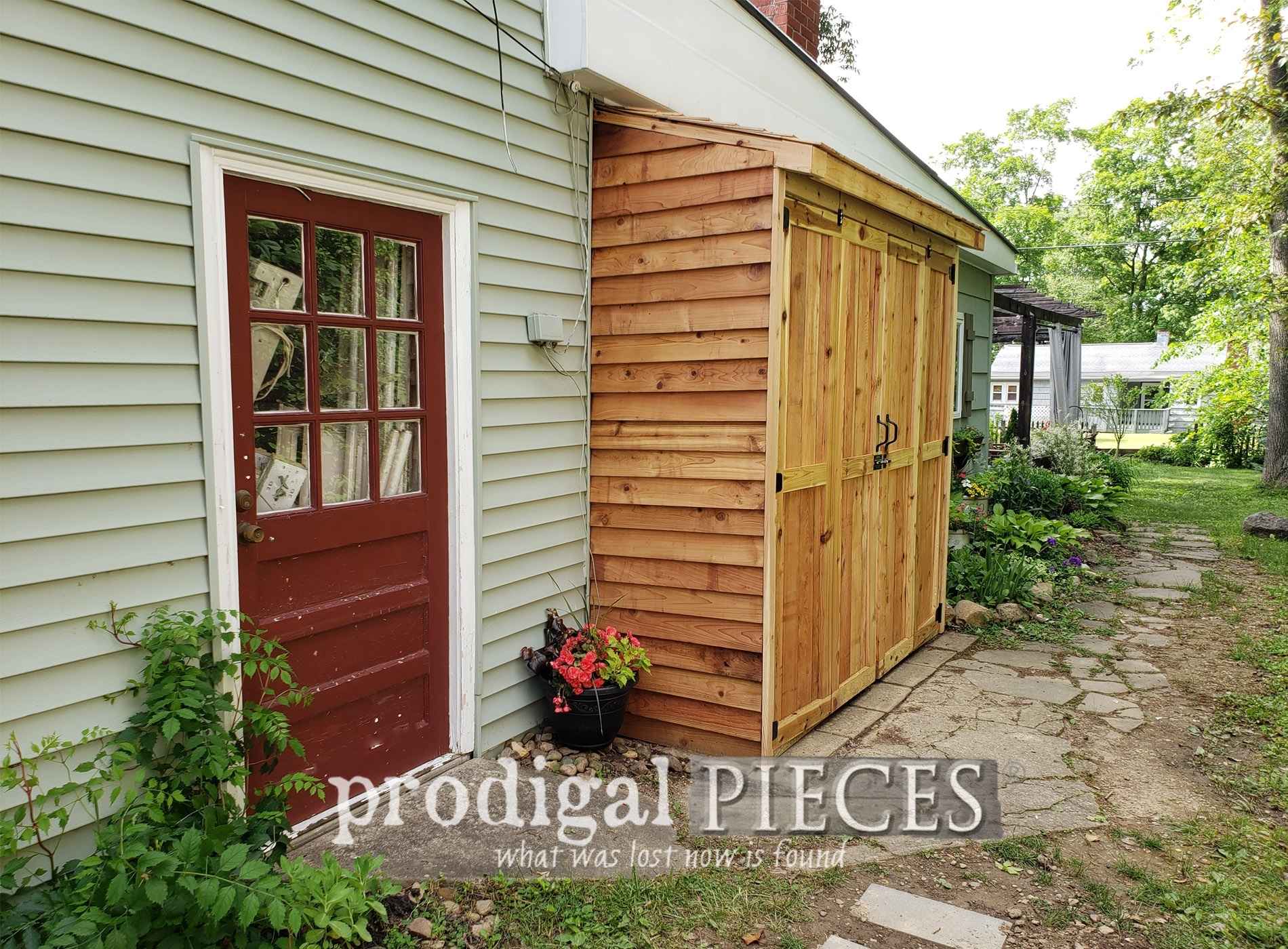 Cedar lean-to style shed attached to a house