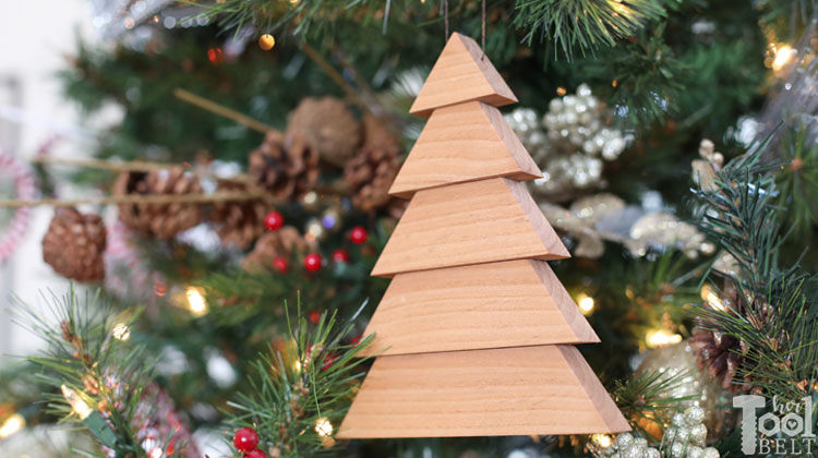 Stacked pieces of wood that form a tree ornament