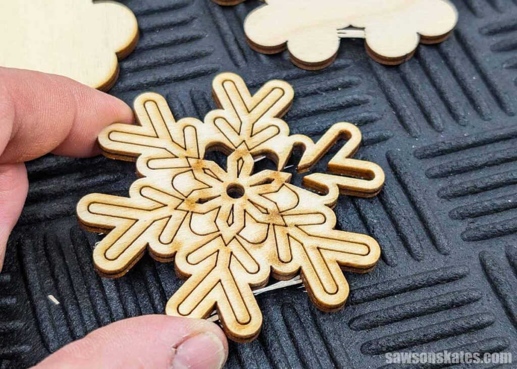 Laser cut ornament with charring