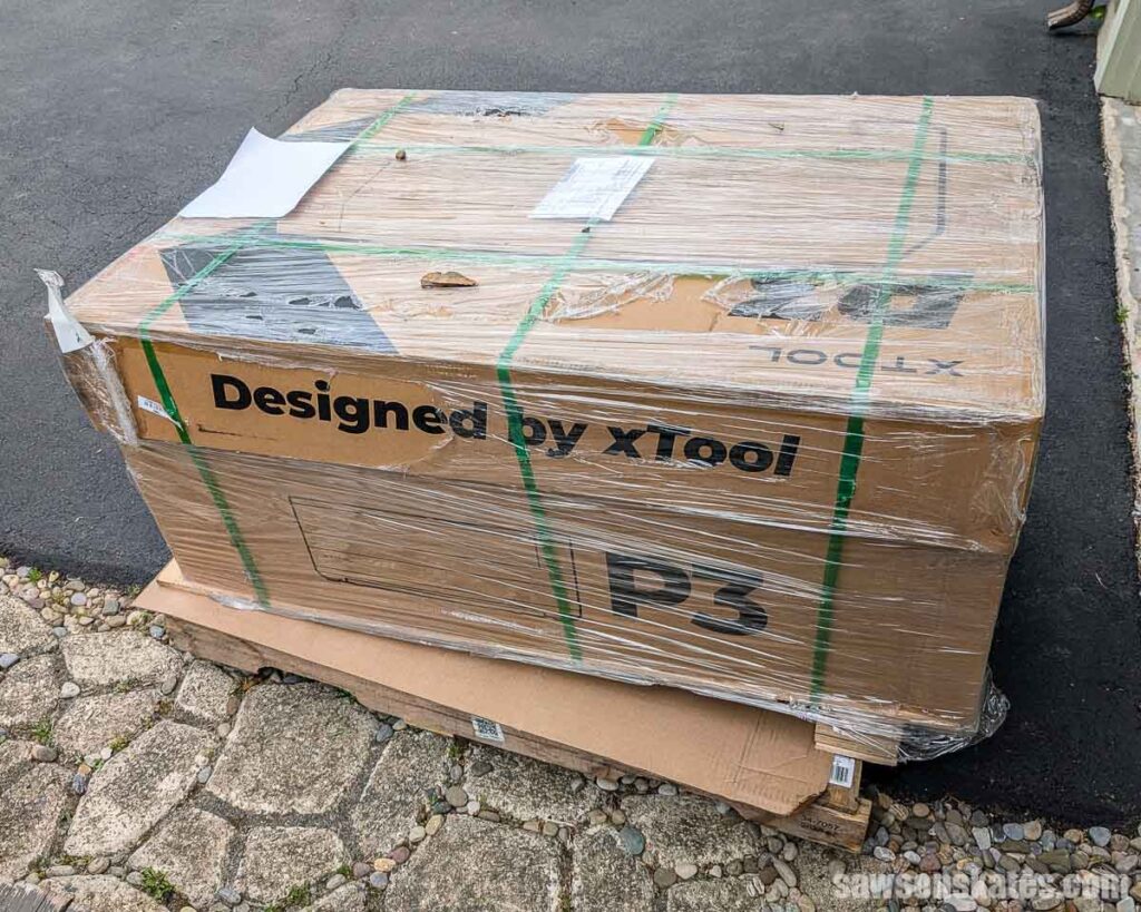 xTool P3 on a pallet in a driveway