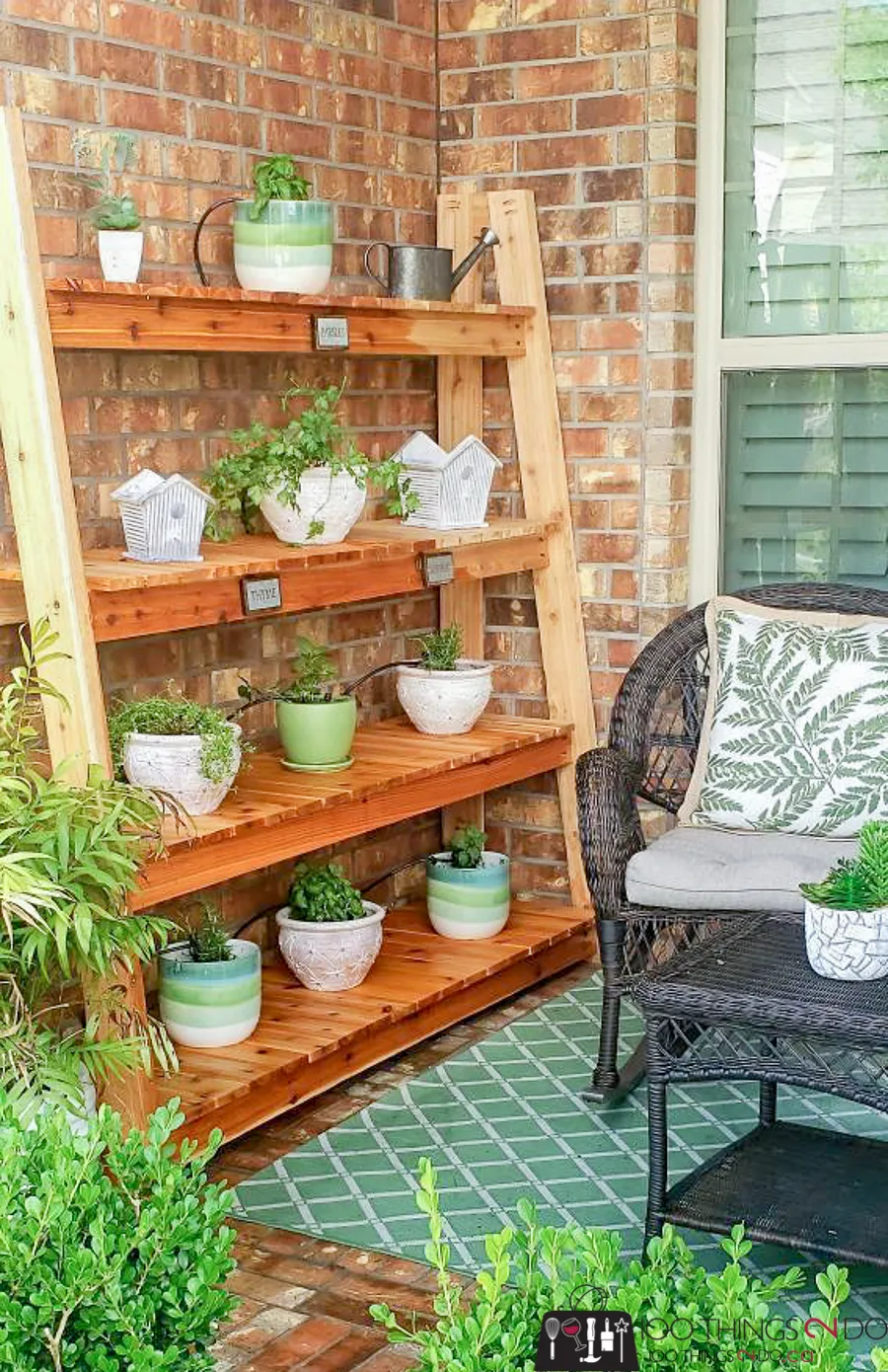 Angled freestanding plant stand on a front porch