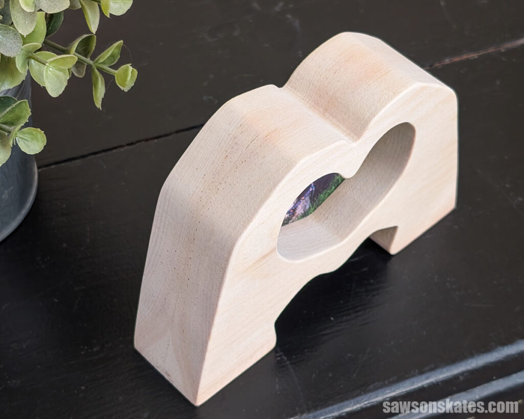 Overhead view of a heart shape with hands photo frame