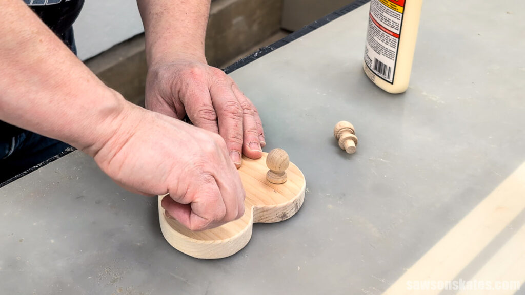 Inserting a wood finial into a hole