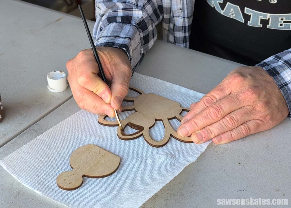 Hands painting the turkey parts