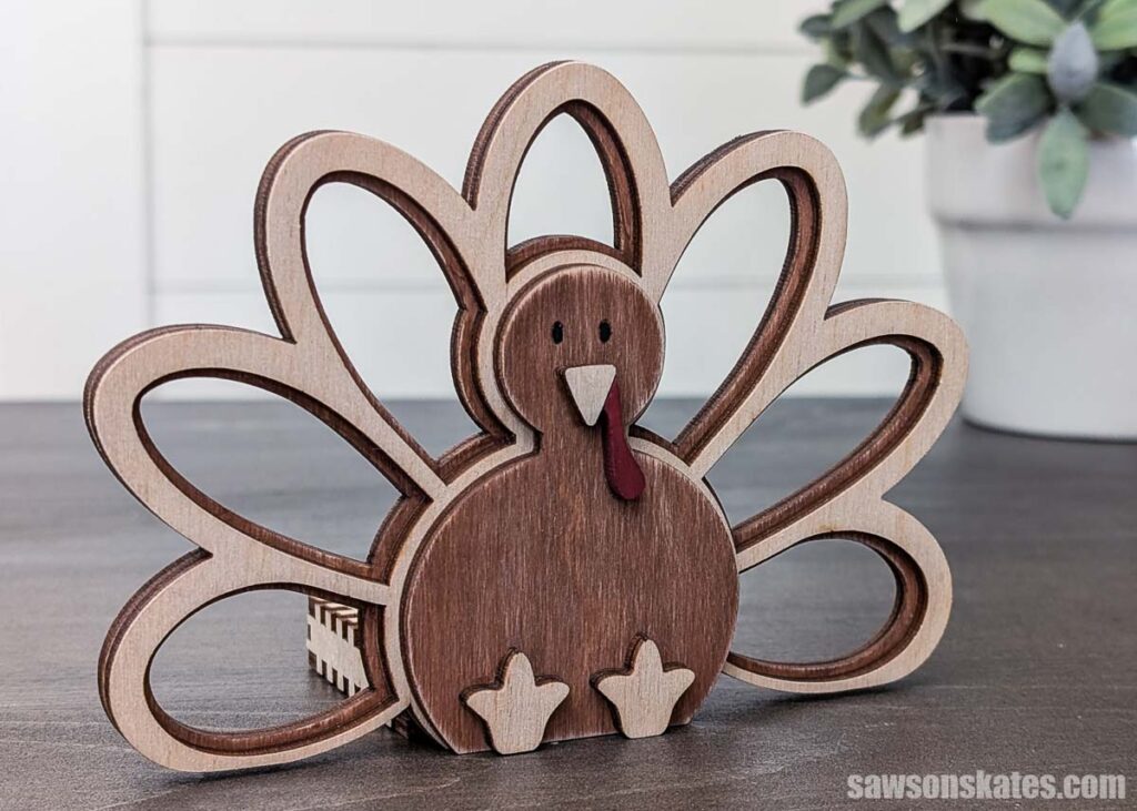 Angled view of a wooden thanksgiving tealight holder