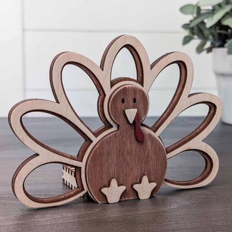 Angled view of a wooden thanksgiving tealight holder