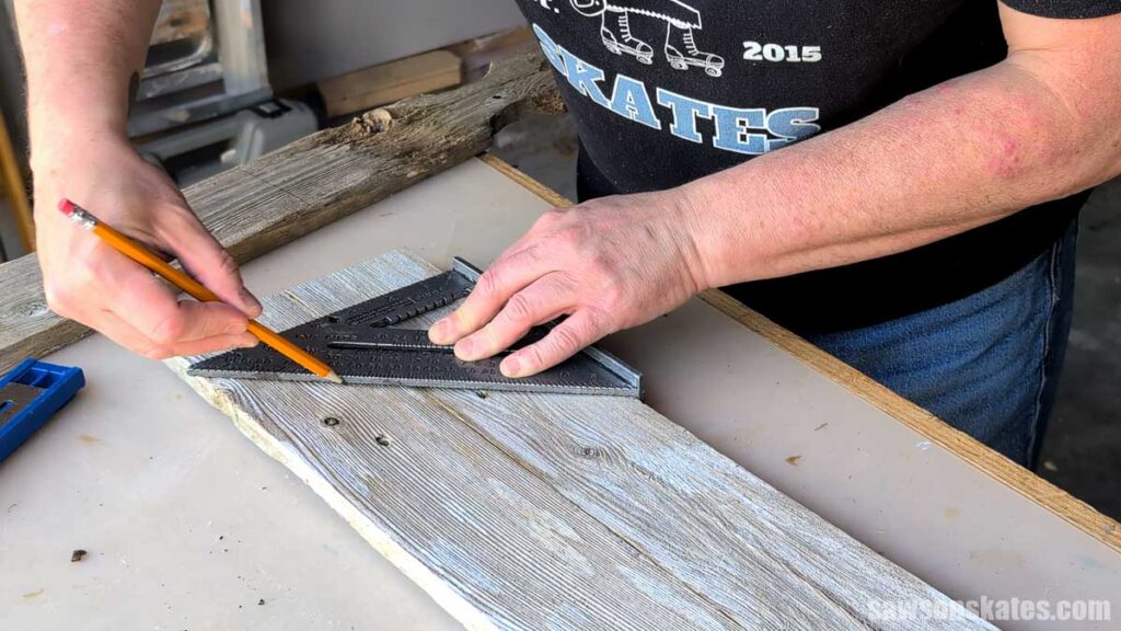 Using a speed square to mark an angle on a board