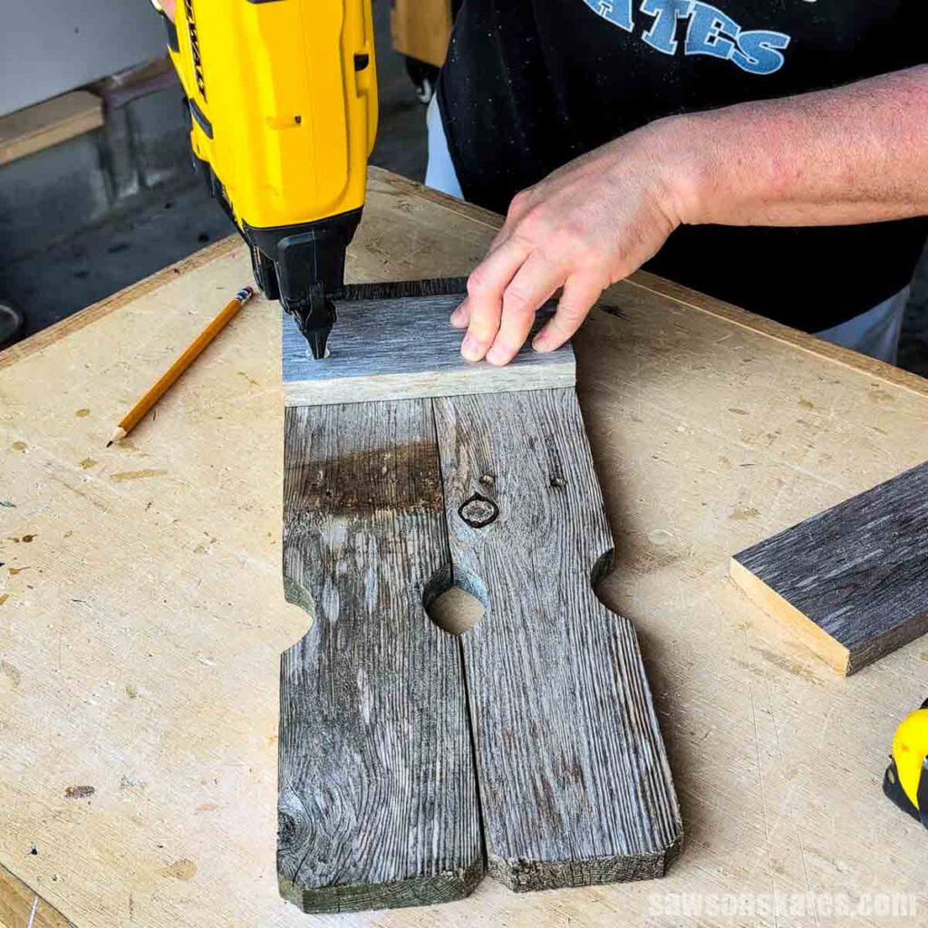 Attaching a cleat to fence pickets with a brad nailer