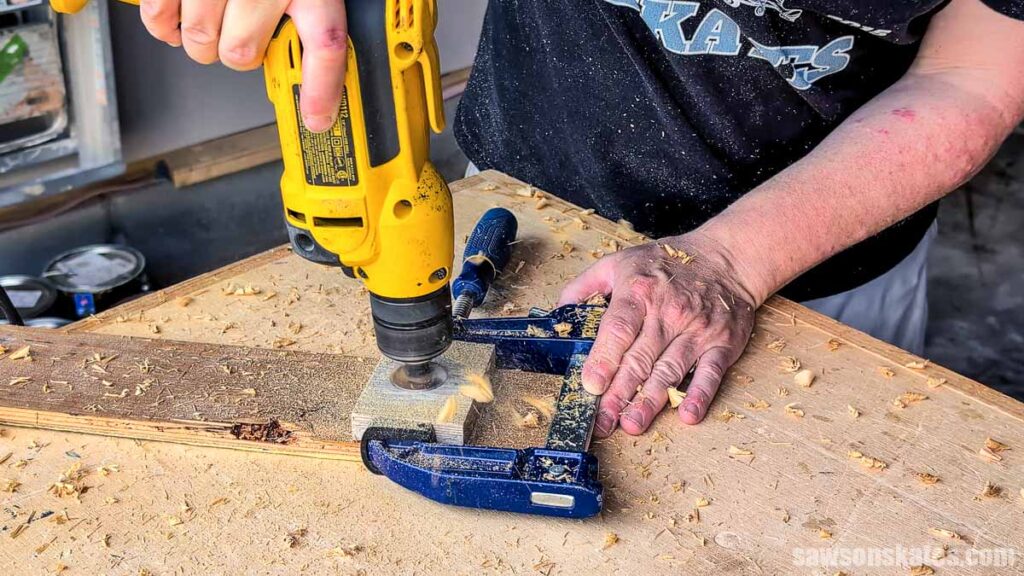 Drilling a hole into a small board