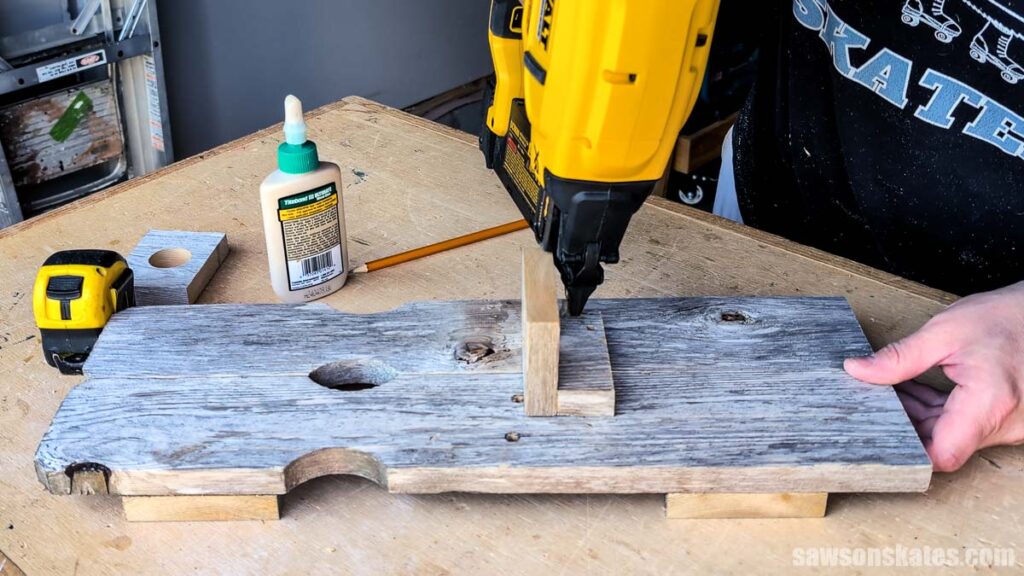 Attaching a holder to fence pickets