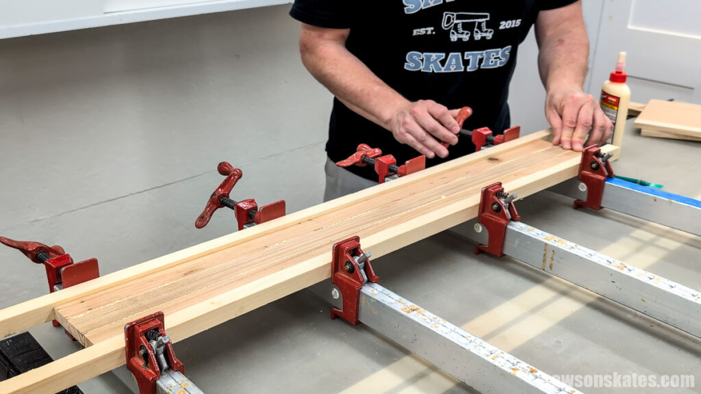 Scott gluing up boards to make a panel