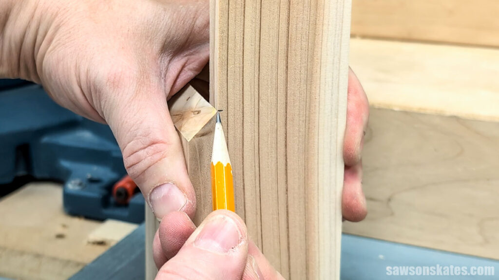 Marking the side for length with a pencil