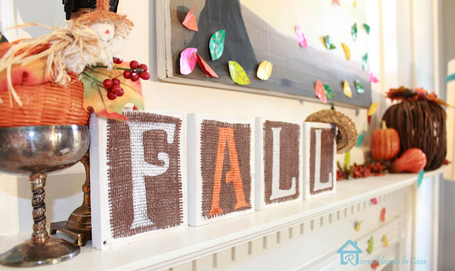 Wood blocks cover with burlap that spell Fall