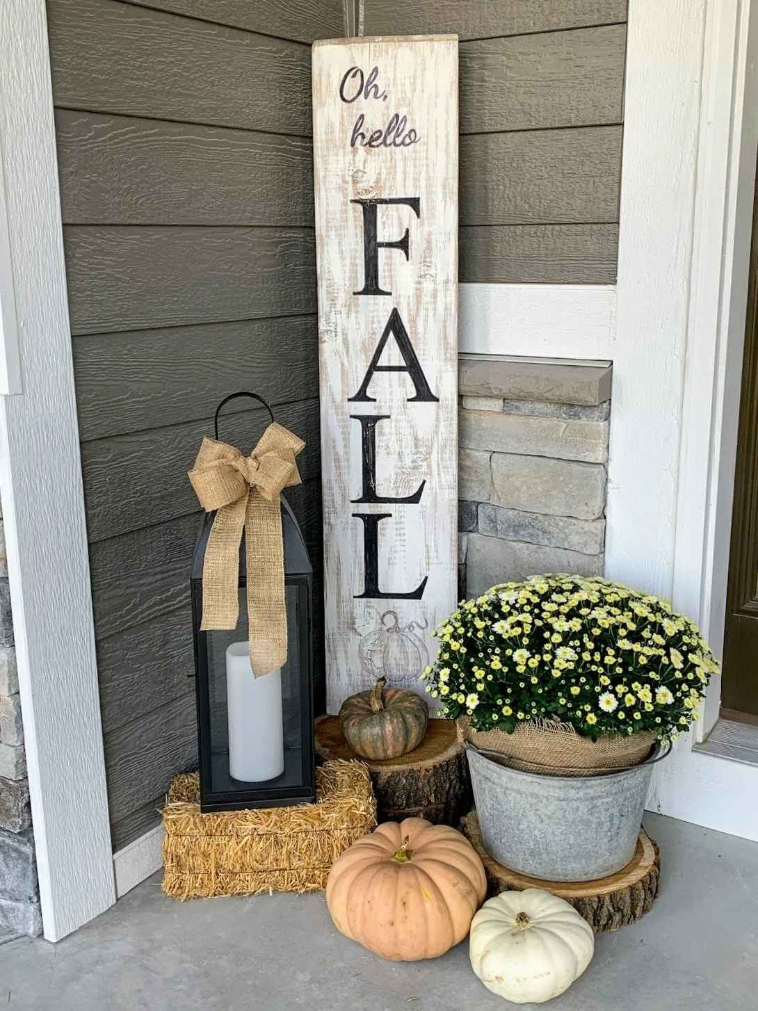 Tall, leaner porch sign that says, " Oh hello FALL"