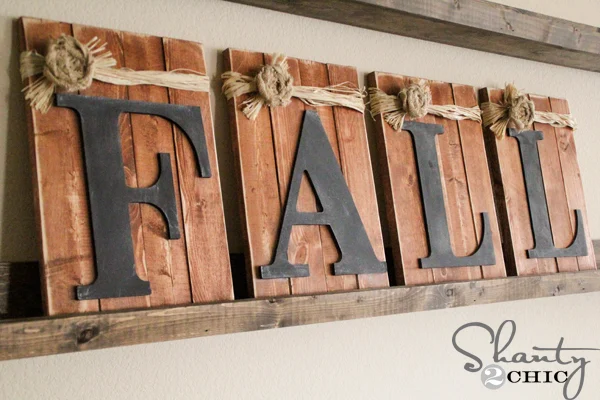 The word fall spelled out on four separate boards