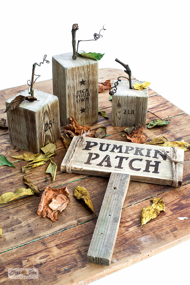Wood pumpkins painted to look like signs